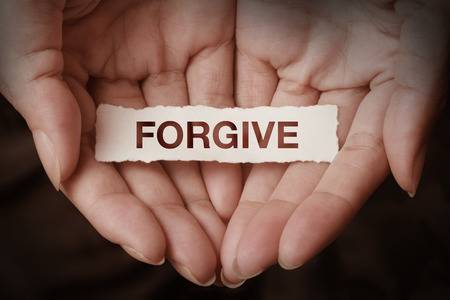 43779184-forgive-text-on-hand-design-concept